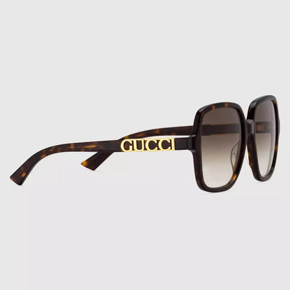 Occhiali da sole Gucci con montatura rettangolare